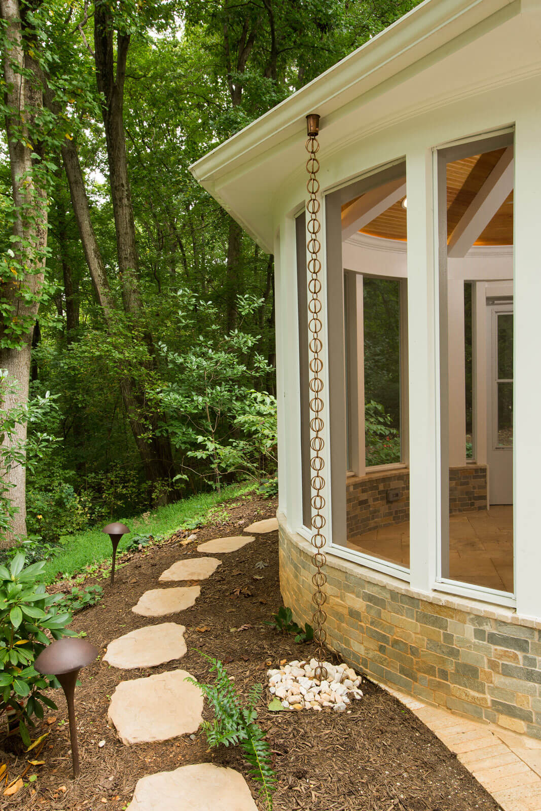 Circular Screened Porch + Patio Integration in Annandale